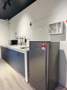 Kuchyň nebo kuchyňský kout v ubytování Cozii Home Marang