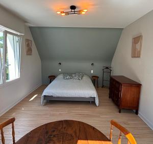 Postel nebo postele na pokoji v ubytování Maison bord de mer