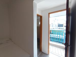 Shoreline Guesthouse 海岸线客栈客房内的一张或多张床位
