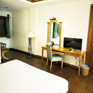 Kresna Hotel電視和／或娛樂中心