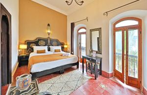 Postel nebo postele na pokoji v ubytování Riad Villa Garance