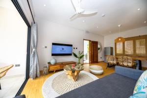 TV o dispositivi per l'intrattenimento presso Anse Boudin Chalets