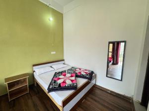 Hotel Rest and Bite客房内的一张或多张床位