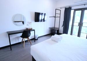 TV a/nebo společenská místnost v ubytování isleep guesthouse