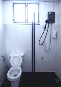 Koupelna v ubytování isleep guesthouse + 8 fotografií