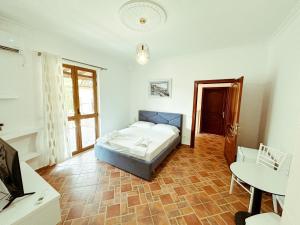 Letto o letti in una camera di Vizion Hotel