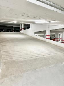 an empty parking lot in an empty parking garage at Suites La Catedral in León