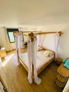 Postel nebo postele na pokoji v ubytování La VILLA MAHOT