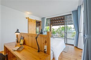 Balkón nebo terasa v ubytování An Oasis 10min To Old Town Vesta Nho Villa