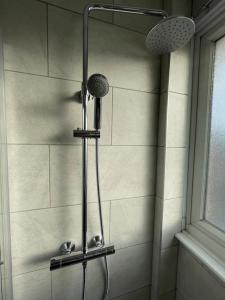 Koupelna v ubytování Luton Home + 11 fotografií