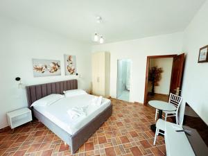 Letto o letti in una camera di Vizion Hotel