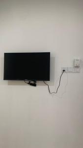 TV a/nebo společenská místnost v ubytování Bilik Umairah