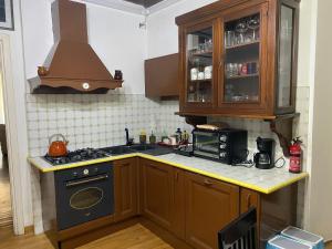 Η κουζίνα ή μικρή κουζίνα στο SWEETSUITE Rome
