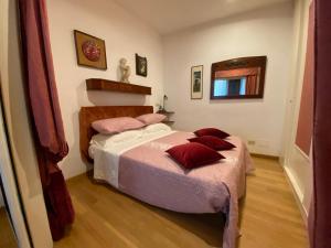 Ένα ή περισσότερα κρεβάτια σε δωμάτιο στο SWEETSUITE Rome