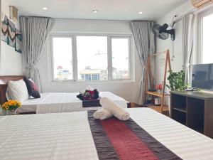 Postel nebo postele na pokoji v ubytování fortuna homestay