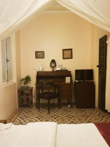 Postel nebo postele na pokoji v ubytování La Villa