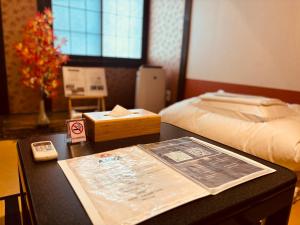 Postel nebo postele na pokoji v ubytování Hostel SAMURISE KURA
