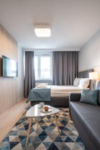 Posteľ alebo postele v izbe v ubytovaní Q19 Apartments Rynek + 27 fotografií