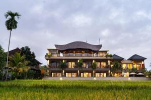 乌布Bliss Ubud Spa Resort的一座带中国屋顶的大房子