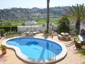 The swimming pool at or close to Belvilla by OYO Villa Boya