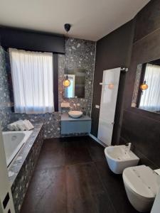 Koupelna v ubytování Hotel Ragno D'Oro