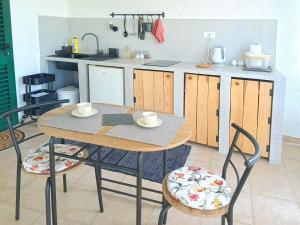 Kuchyň nebo kuchyňský kout v ubytování Apartments Rosa