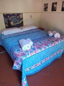 Łóżko lub łóżka w pokoju w obiekcie Apartment ninnananna