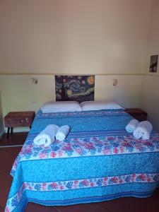 Łóżko lub łóżka w pokoju w obiekcie Apartment ninnananna