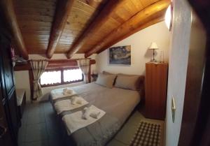 Posteľ alebo postele v izbe v ubytovaní Appartamento incantevole con vista sulla vallata