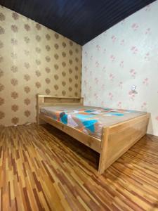 Postel nebo postele na pokoji v ubytování Rumbia Lodge