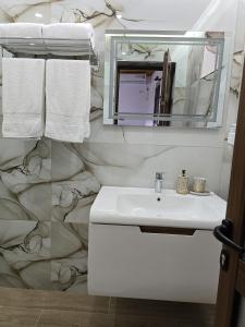 Koupelna v ubytování Hazmurat Hotel