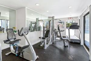 a gym with several treadmills and elliptical machines at Wailea Elua 702 - Ocean Views, Central AC, Wi-Fi in Wailea +10 photos