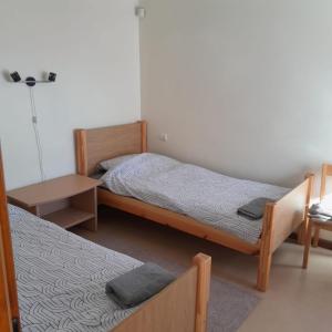 Postel nebo postele na pokoji v ubytování Hostel Jaunvaltes