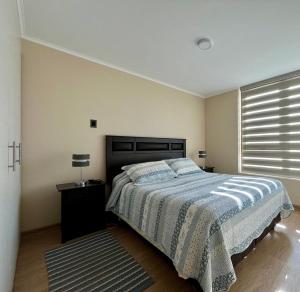 Postel nebo postele na pokoji v ubytování Departamento en Edificio Costanera Playa Villarrica