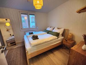 Katil atau katil-katil dalam bilik di Bliss - 2 Schlafzimmer, Boho, Netflix, Arbeitsplatz