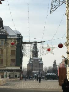 a view of a building with a christmas decoration at casa max in Timişoara