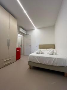 Postel nebo postele na pokoji v ubytování Venus Suites