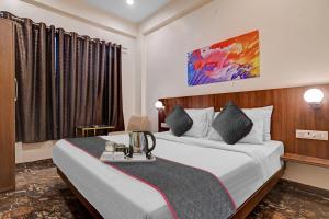 Townhouse Hotel O Benchmark客房内的一张或多张床位