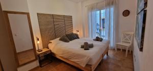 Posteľ alebo postele v izbe v ubytovaní Luxe appartement, centrum Marbella, vlak aan zee!