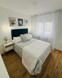 Postel nebo postele na pokoji v ubytování Gaude - Apartamentos Birdie