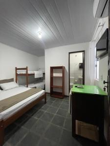 Postel nebo postele na pokoji v ubytování Pousada Vila Nova