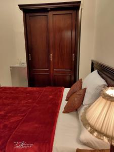 Postel nebo postele na pokoji v ubytování Triomphe Hostel