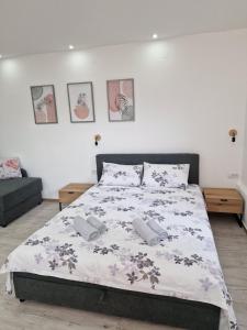 Postel nebo postele na pokoji v ubytování Zed apartmani Leskovac