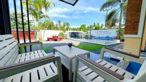 Posezení v ubytování Meenakorn Pool Villa Satun