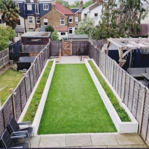 Κήπος έξω από το Room in a house share - Kingsized room 25 min away from Central London