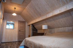 Ένα ή περισσότερα κρεβάτια σε δωμάτιο στο RelaxClub Kersko +57 φωτογραφίες