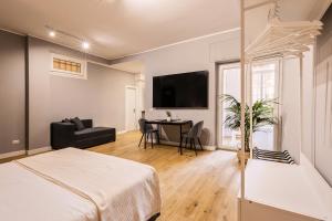 Postel nebo postele na pokoji v ubytování Titina Suites Apartment Rome