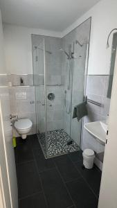 Koupelna v ubytování Gästezimmer Fateev 8