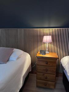 Кровать или кровати в номере Malahide Guest Rooms