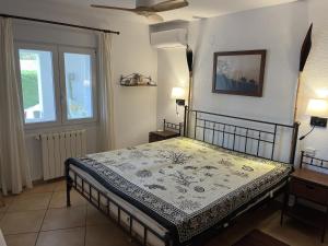 Postel nebo postele na pokoji v ubytování Villa Balcon al Mar + 23 fotografií